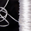 1mm White Rattail Cord - Detail | Mood Fabrics