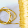 Gold Rattail Cord - Detail | Mood Fabrics