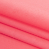 Phosphoric Neon Coral Stretch Twill - Folded | Mood Fabrics