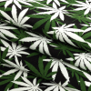 Black, Green and White Cannabis Plant Leaves Printed Stretch Cotton Denim - Folded | Mood Fabrics