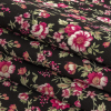 Black and Pink Minute Floral Printed Stretch Cotton Denim - Folded | Mood Fabrics