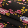 Pink, Blue and Black Floral Printed Stretch Cotton Denim - Folded | Mood Fabrics