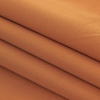 Reverie Amber Ale Solid Polyester Satin - Folded | Mood Fabrics