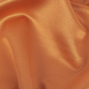 Reverie Amber Ale Solid Polyester Satin | Mood Fabrics
