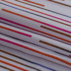 Italian Lavender, Blue, and Red Speed Lines Stretch Rayon Crepe - Folded | Mood Fabrics