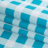 Blue and White Checkered Caye UV Protective Compression Swimwear Tricot with Aloe Vera Microcapsules - Folded | Mood Fabrics
