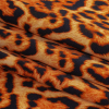 Golden Leopard Spots Caye UV Protective Compression Swimwear Tricot with Aloe Vera Microcapsules - Folded | Mood Fabrics
