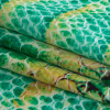 Arcadia and Yellow Python Caye UV Protective Compression Swimwear Tricot with Aloe Vera Microcapsules - Folded | Mood Fabrics