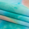 Blue, Green and Orange Tie Dye Caye UV Protective Compression Swimwear Tricot with Aloe Vera Microcapsules - Folded | Mood Fabrics