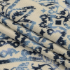 Insignia Blue and Star White Paisley Stretch Rayon Jersey - Folded | Mood Fabrics