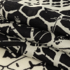 Black and White Alyssum Abstract Silk Charmeuse - Folded | Mood Fabrics