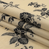 Famous Designer Italian Ebony and Buttercream Floral Cotton and Polyester Jacquard - Folded | Mood Fabrics