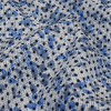 Black Flocked Polka Dots on Blue and White Leaves and Dots Stretch Cotton Shirting - Detail | Mood Fabrics