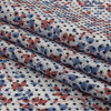 Black Flocked Polka Dots on Red, White and Blue Leaves and Dots Stretch Cotton Shirting - Folded | Mood Fabrics