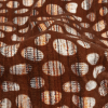 Brown Flocked Bubbles on Brown, Orange and White Distressed Stripes Printed Stretch Cotton Twill - Detail | Mood Fabrics