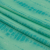 Seafoam, Turquoise and White Tie Dye Stripes Stretch Polyester Sweater Knit - Folded | Mood Fabrics