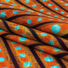 Orange, Espresso and Teal Art Deco Feathers UV Protective Compression Swimwear Tricot with Aloe Vera Microcapsules - Folded | Mood Fabrics