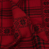 Red and Black Snowflake Plaid Brushed Stretch Polyester Sweater Knit - Detail | Mood Fabrics