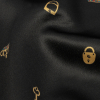 Ralph Lauren Black and Gold Logos and Icons Polyester Charmeuse - Detail | Mood Fabrics