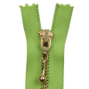 Lime and Antique Gold T5 Closed End Metal Zipper with Decorative Pull - 5" - Detail | Mood Fabrics