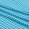 Turquoise and White Shepherd's Check Heavyweight Stretch Cotton Jersey - Folded | Mood Fabrics