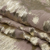 Aralia Tan and Gold Abstract Foiled Polyester Chiffon Plisse - Folded | Mood Fabrics