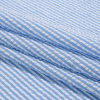 Wylie Country Blue and White Candy Striped Polyester and Cotton Seersucker - Folded | Mood Fabrics