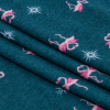 Blue and Pink Flamingos and Stars Stretch Polyester Sweater Knit - Folded | Mood Fabrics