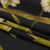 Mood Exclusive Black Dolomite Daisies Sustainable Viscose Crepe - Folded | Mood Fabrics