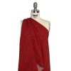 Mood Exclusive Red Dandelion Dreamer Stretch Polyester Seersucker - Spiral | Mood Fabrics