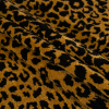 Gold and Black Leopard Spots Viscose and Polyester Upholstery Chenille - Folded | Mood Fabrics