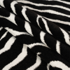 Black and Ivory Zebra Stripes Viscose and Polyester Chenille Upholstery Jacquard - Folded | Mood Fabrics