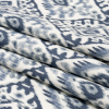 Muted Blue, Navy and White Decorative Ikat Diamonds Cotton Canvas - Folded | Mood Fabrics