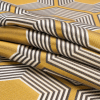 Gold, Charcoal and Gray Reverberating Hexagons Polyester Jacquard - Folded | Mood Fabrics