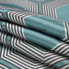 Teal, Charcoal and Gray Reverberating Hexagons Polyester Jacquard - Folded | Mood Fabrics