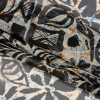 Blue, Orange and Black Wax Resist Floral Silk Chiffon - Folded | Mood Fabrics