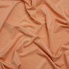 Famous Australian Designer Peach Stretch Polyester Jersey | Mood Fabrics