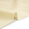 Alida Cream Faux Upholstery Leather with Brushed Fabric Backing - Detail | Mood Fabrics