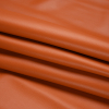 Macoun Henna Pebbled Outdoor Upholstery Faux Leather - Folded | Mood Fabrics
