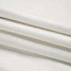 Macoun Optic White Pebbled Outdoor Upholstery Faux Leather - Folded | Mood Fabrics