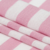 Pressed Rosebloom and Bright White Bengal Striped Polyester Jersey - Folded | Mood Fabrics