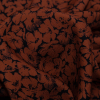 Mood Exclusive Poppy Paradise Rust Stretch Polyester Crepe - Detail | Mood Fabrics