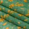 Mood Exclusive Teal Dance with the Daffodils Viscose Georgette - Folded | Mood Fabrics