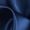 Ultra Indigo Solid Polyester Satin - Detail | Mood Fabrics