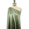 Premium Oil Green Stretch Silk Charmeuse - Spiral | Mood Fabrics