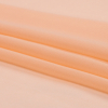 Premium Peach Silk Chiffon - Folded | Mood Fabrics