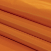 Italian Amber Premium Polyester Taffeta - Folded | Mood Fabrics