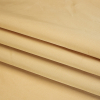 Premium Soft Gold Silk Duchesse Satin - Folded | Mood Fabrics