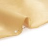 Premium Soft Gold Silk Duchesse Satin - Detail | Mood Fabrics
