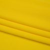 Premium Sun Yellow Rayon Matte Jersey - Folded | Mood Fabrics